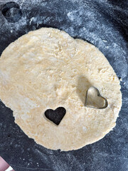 Cooking homemade cookies, heart shape