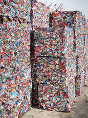 Crushed aluminium cans in a recycling plant.