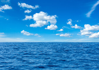 Fototapeta na wymiar Blue sunny sea water surface