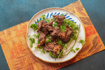Meat cubes cooked over the oven and shot overhead
