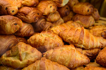Butter puff croissants on display in artisanal bakery in Paris, France
