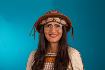 Young woman with festa junina outfit in studio - obrazy, fototapety, plakaty