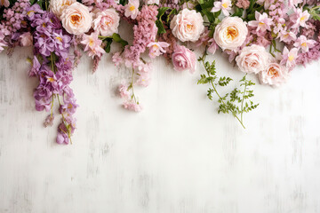 Obraz na płótnie Canvas roses flower arrangement on top side, over a textured layflat