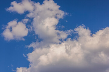 Naklejka na ściany i meble Beautiful view of blue sky with white clouds on sunny day.