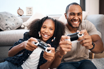 Fototapeta Gaming, family or children with a father and daughter in the living room of their home playing a video game together. Kids, happy or fun with a gamer dad and girl child in the house to play online obraz