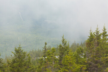 Fototapeta premium Fog lifting out of the valley at Mt. Kearsarge.