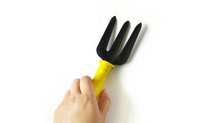 Garden fork isolated on white background. Gardening tool equipment