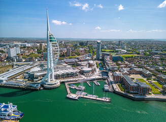 The drone aerial view of Spinnaker Tower and Portsmouth Harbour. Portsmouth is a port city and...