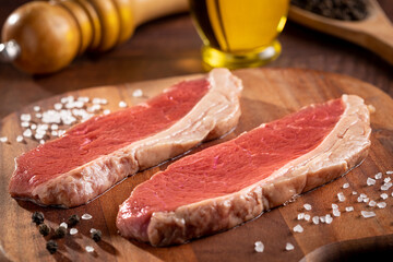 Raw picanha steak on the cutting board.