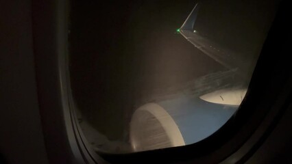 Jet engine night flying with rain