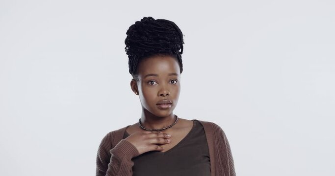 Portrait, shock and question with an offended black woman in studio on a white background in disbelief. Bad, facial expression and doubt with an attractive young female person hearing negative gossip