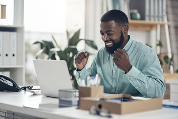 Black man, success and laptop to celebrate business profit, win or achievement in a modern office. African male entrepreneur at a desk with motivation and technology for bonus, victory and promotion