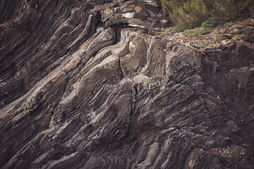 Mountain Stone Pattern & Texture. Textured background of uneven surface of surface of rough rocky...