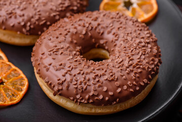 Delicious chocolate glazed donut sprinkled with chocolate chips