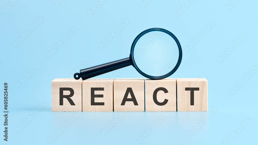 Poster react word made with building blocks, business concept