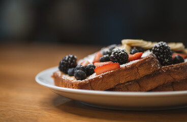 French bread. brioche bread with red berries and maple honey