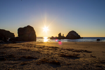 sunset on the rocky beach