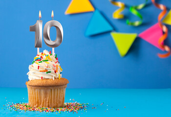 Birthday cake with candle number 10 - Blue background