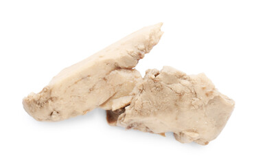Pieces of tasty cod liver on white background, top view