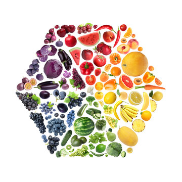Hexagon shape made of many fresh fruits and vegetables arranged in rainbow colors on white background