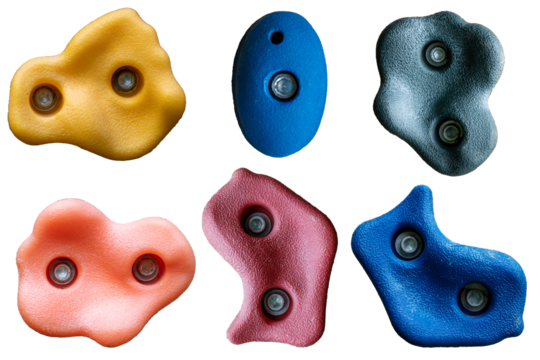 Set of grips different colors and shapes for climbing wall isolated on white background / set collection of various artificial climbing holds with clipping path / bouldering extreme sport
