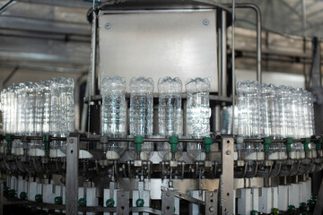 empty plastic bottles on a conveyor