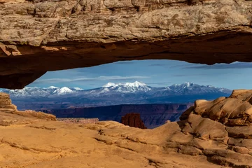 Foto auf Leinwand A view of Mount Waas and Mount Peale looking thru Mesa Arch in Canyonlands National Park © TooTallEdPhotography