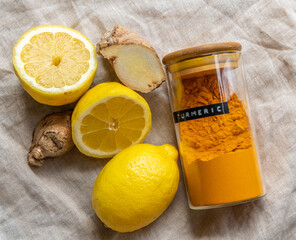 Fresh ginger and lemon with ground turmeric immunity booster