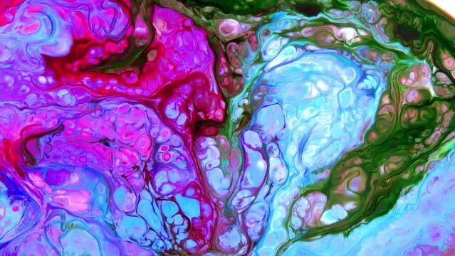 Liquid Colorful Paint Pattens Mix in Slow Motion. Liquid Color Paint Patterns Texture Top View. Multicolor Liquid Paint Surface.