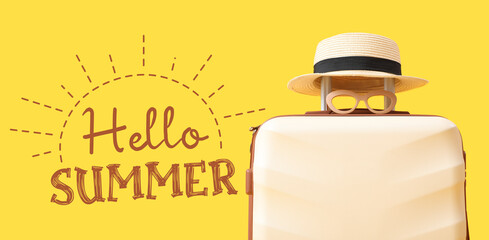 Suitcase with beach hat and sunglasses on yellow background. Hello summer