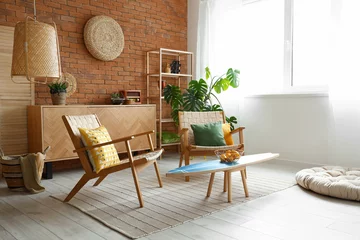 Papier Peint photo Lavable Échelle de hauteur Cozy wooden armchairs with cushions and fruit basket on surfing board in interior of living room