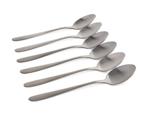 Stainless steel spoons on white background