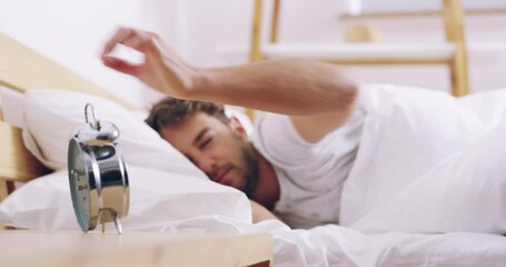 Alarm, clock and wake up, man in bed sleeping for rest or refresh in morning, getting ready for start of day in apartment. Sleep, dream and person waking in bedroom after snooze or nap time in home. - Powered by Adobe