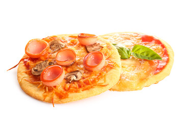 Different tasty mini pizzas on white background
