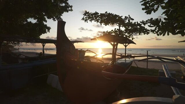 Kuta Beach from fishing boat outriggers at sunset, Kuta Beach, Kuta, Bali, Indonesia, South East Asia