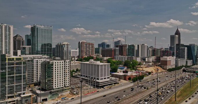 Atlanta Georgia Aerial v825 flyover midtown along Interstate 85 freeway towards Georgia tech institute campus capturing rush hour traffics and downtown cityscape - Shot with Mavic 3 Cine - May 2022