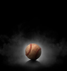 baseball ball with on black background with smoke