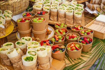 Fototapeta premium Fruits and healthy food catering in a table