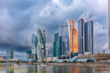Obraz premium High buildings of Moscow-City at Moskva River at summer sunset, Russia.