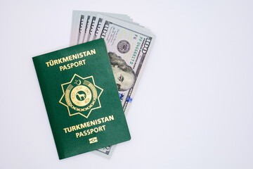 passport republic of turkmenistan with usd dollars on white