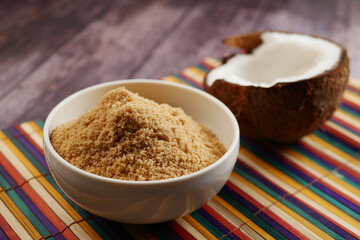 coconut sugar in a white bowl on table 