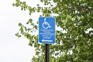 Blue handicap sign: a symbol of accessibility, inclusivity, equal rights, and support for individuals with disabilities