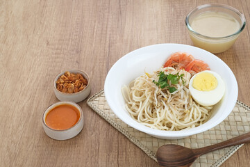 Mie Celor, a noodle dish from Palembang, South Sumatra, Indonesia. Served in a thick and savory shrimp broth with complements such as eggs, shrimp, bean sprouts, and celery.
