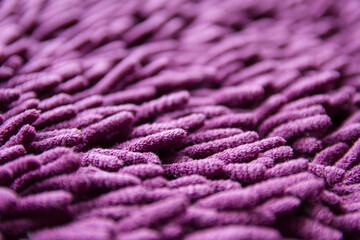 closeup view of purple carpet texture