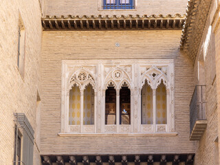 Zaragoza, Spain - May 01, 2023: details of the buildings in the historic center of the city of Zaragoza, in this case, Deam's arc, in Zaragoza, Spain
