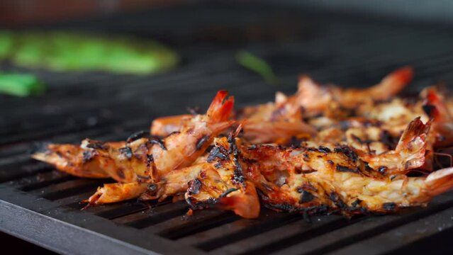 Mexican latin grill with green onions nopales and grilled shrimps at mexican restaurant cuisine camarones a la parrilla rack focus