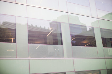 modern glass-windowed business complex signifies transparency, innovation, and connectivity,...