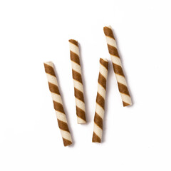 Wafer rolls with chocolate isolated on white background.