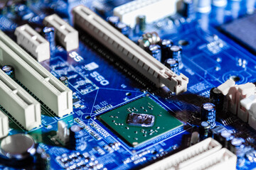 Electronic circuit board.Mainboard Electronic computer background.Motherboard digital chip. Technology background.Selective focus.