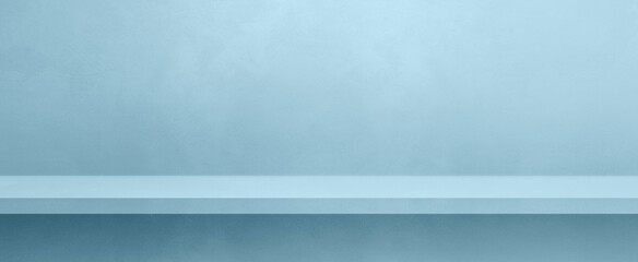 Empty shelf on a light blue concrete wall. Background template. Horizontal banner mockup
